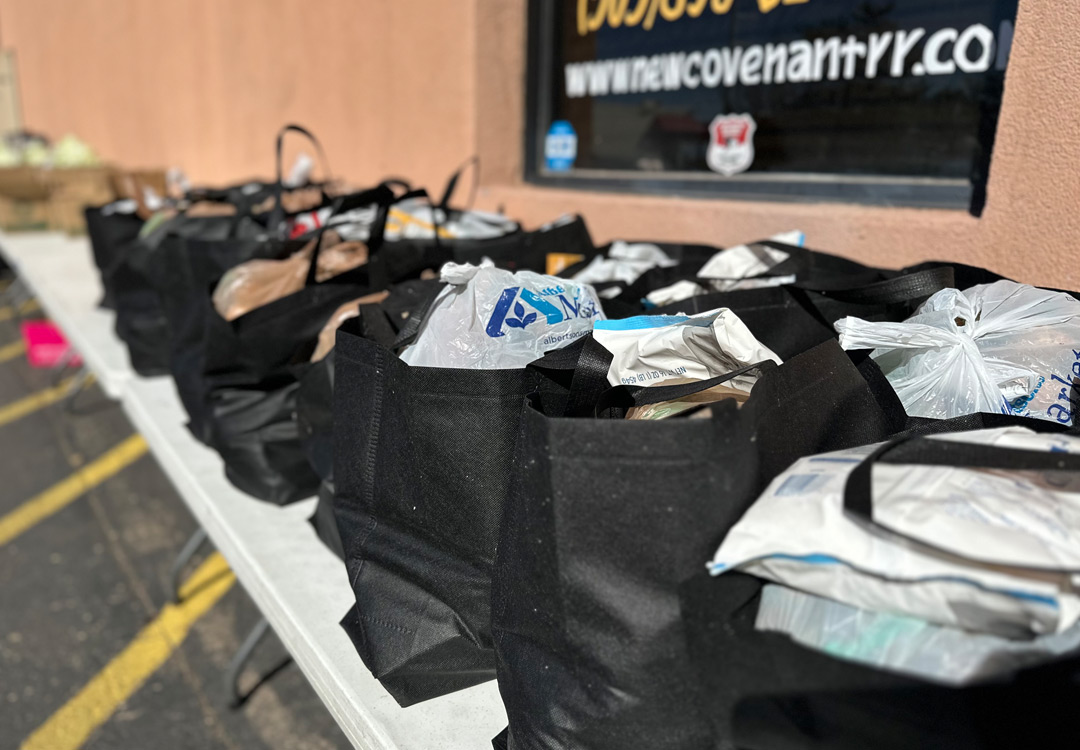 Community volunteers distributing food and supplies